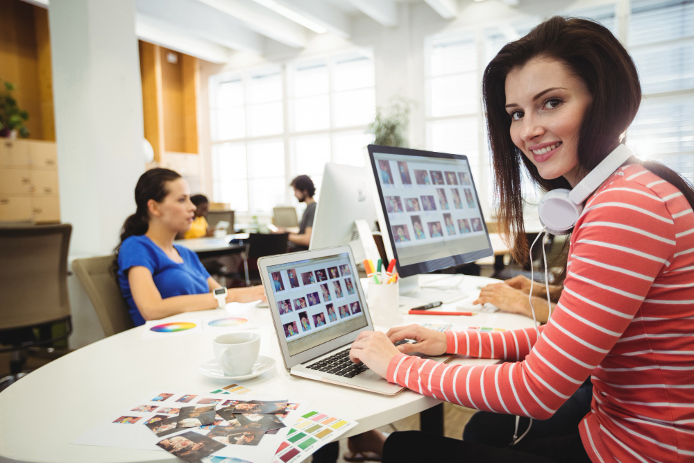 A dedicated team of web designers collaborating in a bright and modern office environment
